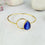 Saira Teardrop blue cat's eye bangle