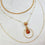 Saira Teardrop Orange Cat's eye layered Necklace