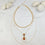 Saira Teardrop Orange Cat's eye layered Necklace